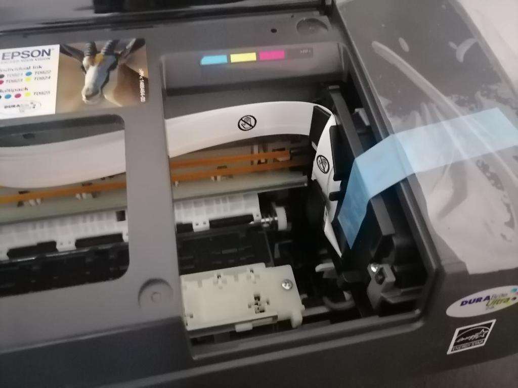 EPSON SYTLUS C91 COLOUR PRINTER, ITEM LOOKS NEW WITH PLASTIC ON, NOT TESTED