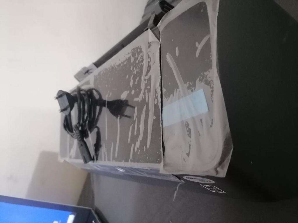 EPSON SYTLUS C91 COLOUR PRINTER, ITEM LOOKS NEW WITH PLASTIC ON, NOT TESTED