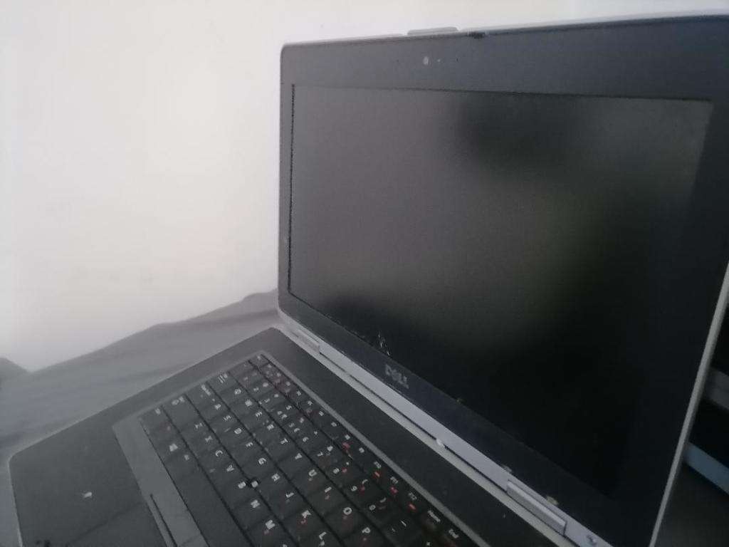 **DELL LATITUDE LAPTOP*NO CHARGER,NOT TESTED*SOLD AS IS, SPARES OR REPAIRS**