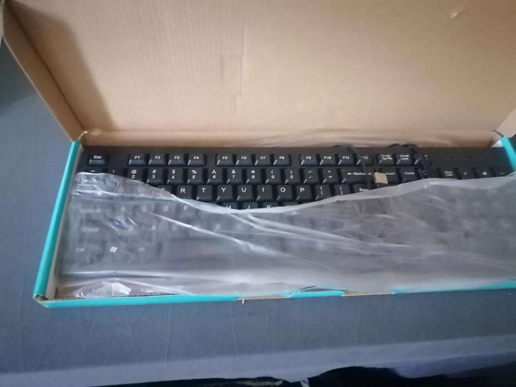 *NEW LOGITECH WIRELESS KEYBOARD PLUS MICROSOFT WIRED KEYBOARD*ONE BID FOR BOTH*
