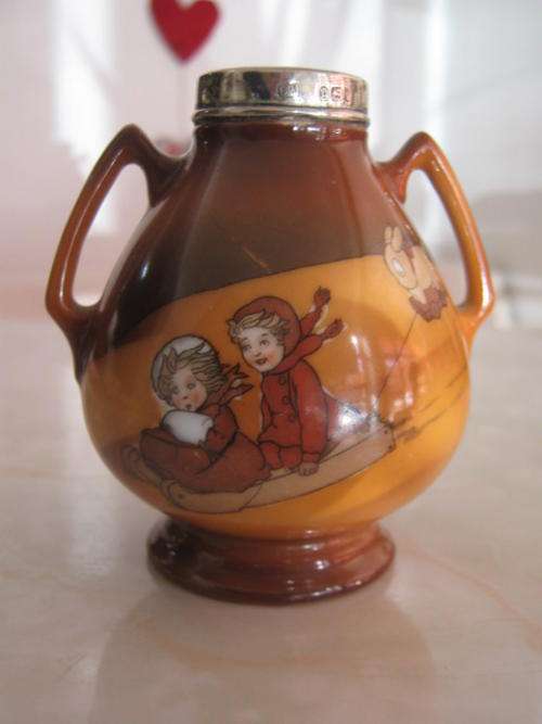 SMALL VASE WITH HALLMARKED SILVER RIM