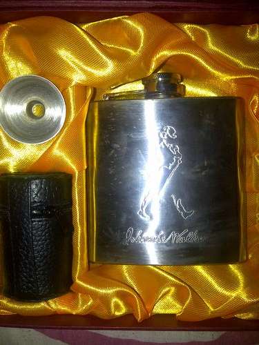 Silver Johnny walker flask set.