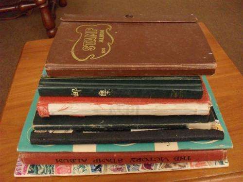 8 X SCHOOLBOY STAMP ALBUMS (MANY STAMPS ) !!!!!!!!!