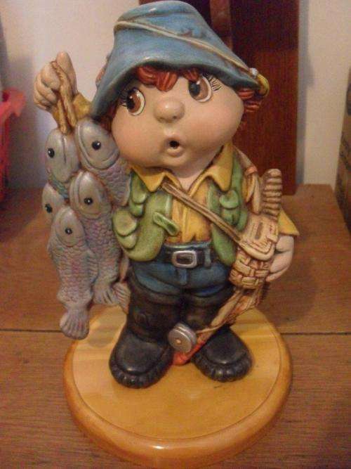 SO CUTE....FISHING  BOY ORNAMENT ON A WOODEN BASE....