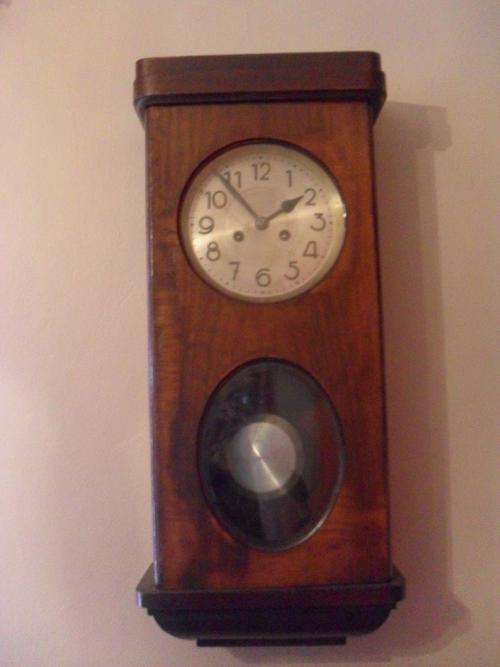 VINTAGE....A HUGE WOODEN WALL CLOCK.....UNUSUAL ROUND AND OVAL GLASS ...