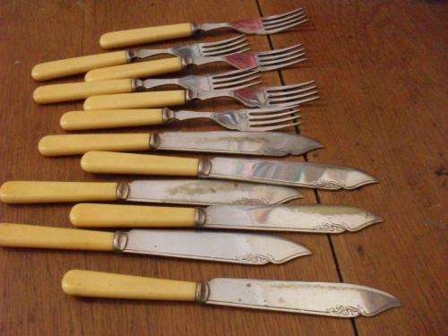 SOME VINTAGE BONE HANDLE EPNS FISH KNIVES AND FORKS