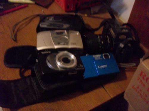 5 CAMERAS ON OFFER ....SOLD AS IS UNTESTED
