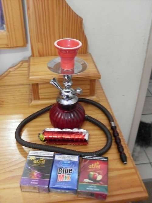 PRETTY HUBBLY BUBBLY HOOKAH AND ACCESSORIES....