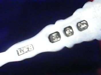 BOXED SET OF 4 HALLMARKED SILVER  TEASPOONS AND A SUGAR TONG...47.17 GRAMS