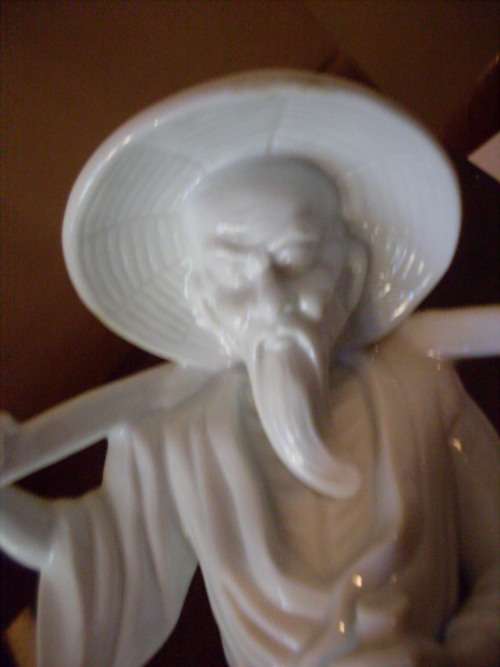 STUNNING FIGURINE .. WHITE PORCELAIN ORIENTAL MAN CARRYING BUCKETS