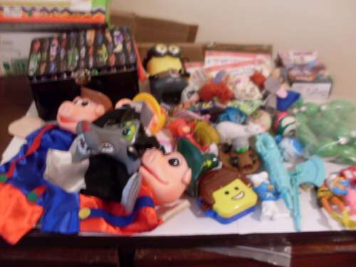 A COLLECTION OF TOYS /MUSIC DVDS/HAND PUPPETS  ETC ETC ETC