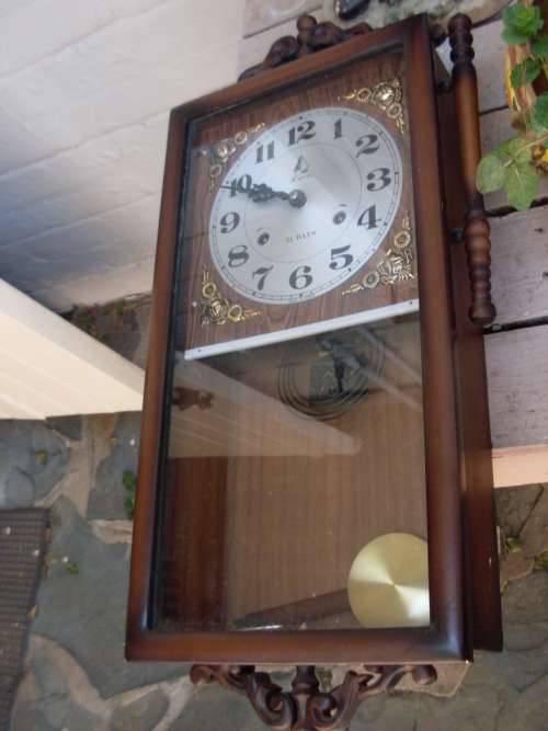 LOVELY WALL CLOCK WITH PRETTY CARVED DECORATIVE PIECES ON TOP BOTTOM AND SIDES