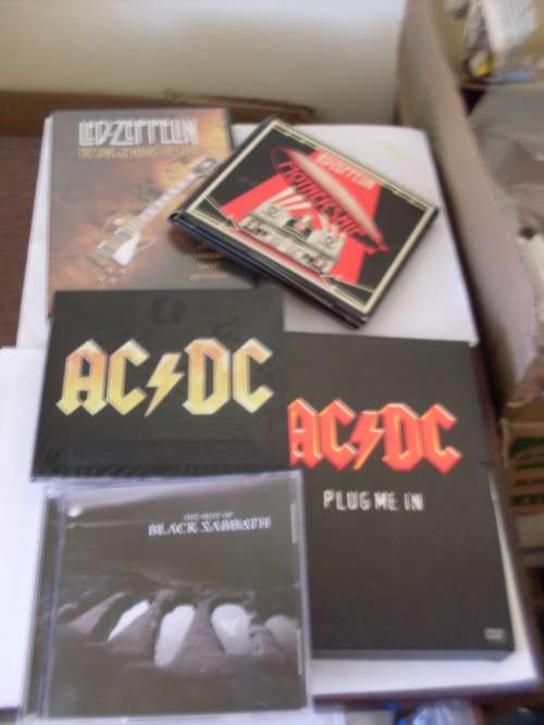 AC DC...BLACK SABBATH AND LED ZEPPELIN MUSIC CDS/DVDS