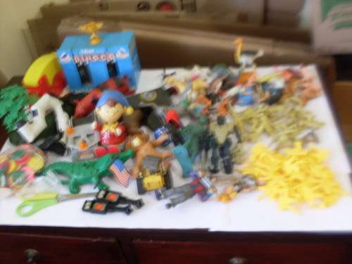 A COLLECTION OF VARIOUS TOYS ...PLASTIC FARM ANIMALS SOLDIES AND MORE