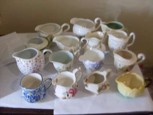 A COLLECTION OF 15 VARIOUS VINTAGE AND OTHER  MILK JUGS