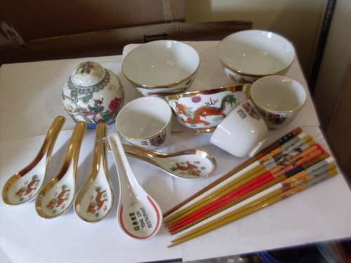 A COLLECTION OF VARIOUS BEAUTIFUL ORIENTAL BOWLS SPOONS AND CHOPSTICKS