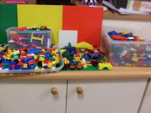 LOTS  AND LOTS AND LOTS OF LEGO PIECES ...LEGO FIGURINES...ETC ETC ETC