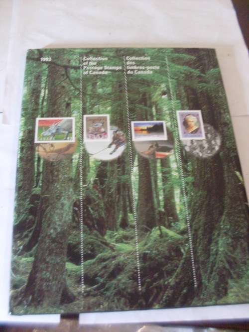 BEAUTIFUL H/C WITH D/C ILLUSTRATED 1993 WITH ALL THE POSTAGE STAMPS OF CANADA