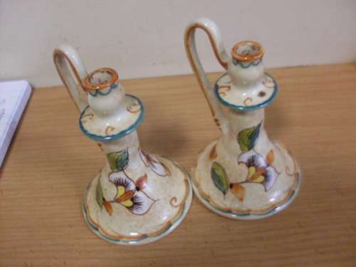 A PAIR OF RARE GOUDA COLOURFUL CANDLESTICKS SIGNED BY IRENE