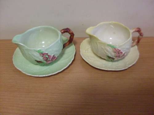 1 GREEN 1 YELLOW  CARLTONWARE PORCELAIN CREAM JUGS WITH SPILL SAUCERS