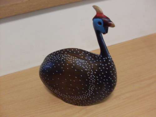 FEATHERS OF KNYSNA GALLERY LIMITED EDITION WOODEN HANDCARVED CROWNED GUINEA FOWL