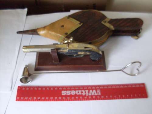 VINTAGE BELLOWS..S/P  CANDLE SNUFFER AND BRASS PISTOL ON DISPLAY