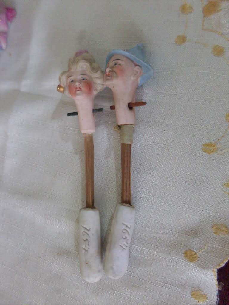 2 UNUSUAL PORCELAIN ORIENTAL  BOBBING/NODDING HEAD FIGURINES...17 CM TALL EACH...MARKED 7654