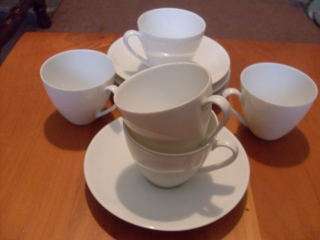A FEW WHITE ARTZBERG CUPS AND SAUCERS !!!!