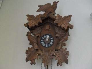 A STUNNING GERMAN CUCKOO CLOCK (COMPLETE)