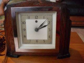 A TEMCO ELECTRIC CLOCK ((MADE IN ENGLAND ))
