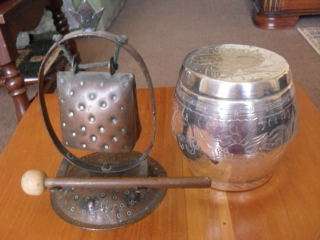 A COPPER GONG WITH WOODEN STICK TO HIT ITS  DINNER TIME FOR YOU....