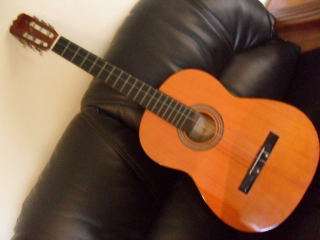 A LOVELY 6 STRING GUITAR