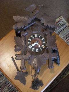 A CUCKOO CLOCK !!!!!! HAVE A LOOK AT THE PICS PLEASE !!!!!!
