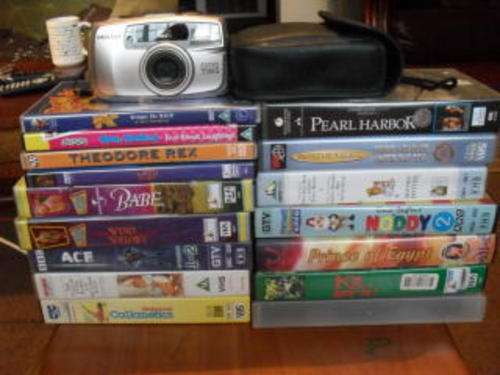 12 X VHS MOVIES AND 4 X DVDS AND A 35 MM PENTAX CAMERA !!!!!!!!