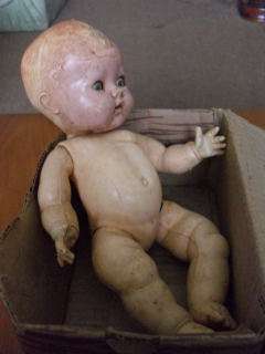 A VERY COLLECTABLE HARD PLASTIC DOLL MARKED B.N.D. LONDON ON HEAD AND BODY !!!!!!!