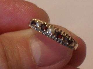 A GOLD 4 RUBIES AND 2 PEARLS RING !!!!