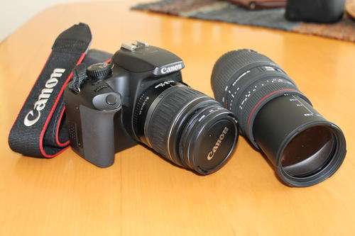 Canon EOS 1000D, 18-55 AF Zoom lens, Flash card, battery, strap