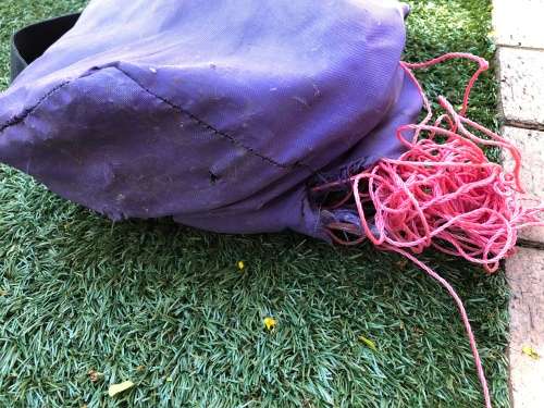 Beach volleyball net and polls