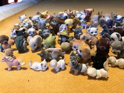 large collection of collectable mini dog figures for playing or collection - approx 60