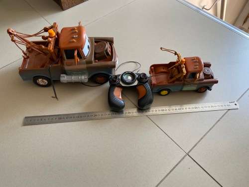 2 RC CARS truscks and a remote - untested