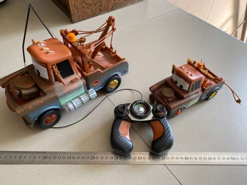 2 RC CARS truscks and a remote - untested