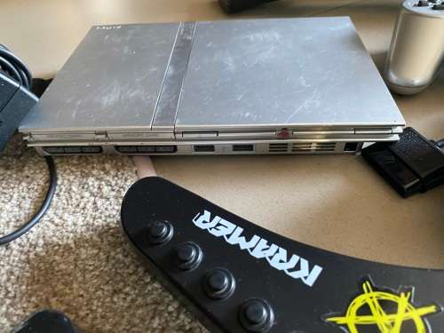 Large PS2 bundle with 13 games, 3 guitars, 2 controllers and more - very nice