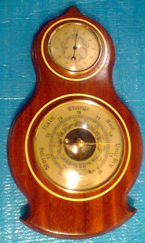 A Old Vintage Barometer mounted in " Railway Sleeper Wood Made in France " with Tempreture Gauge.