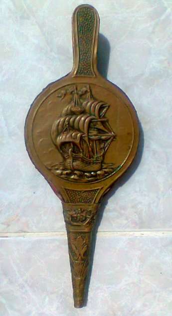 A Very Old 1930's Vintage Bellows with a Sail Gallion Motif in Brass . All in good condition .
