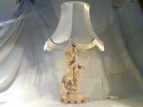 By Famous Artist "Le Ron" A OLD CHERUB Lamp with Original Shade.In Excellent Working Order.