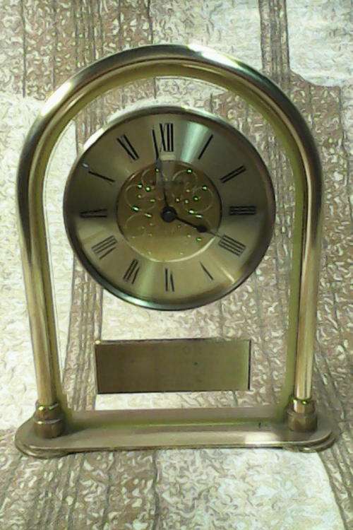 A Deceased Estate "10 year" Presentation Brass "STAGER" Mantle Clock in Excellent working Condition.