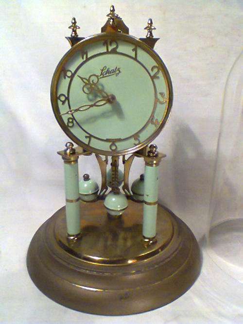 A Anniversary Brass Glass Domed Schatz Mantel Clock. Ideal Gift for Xmas, in good condition.