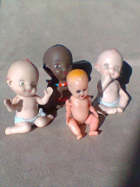 For the Collector 4 tiny Doll's, 3 Kewpie Doll's & a Composite Doll.In good second hand condition