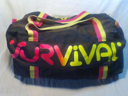 A Survival Scuba bag with 2 set's of Flippers Sizes 7-9 & 3 Masks/Snorkels, A set of Ball's & Bats.