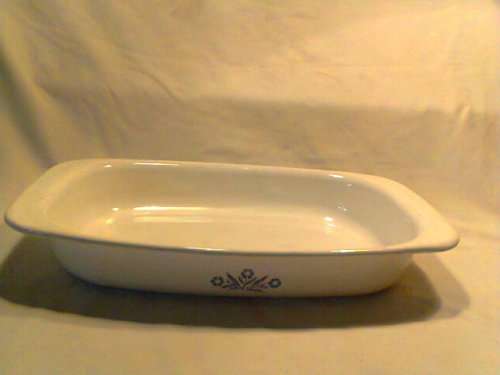 A first edition "CORNING WARE" roasting pan made in USA. Needs TLC. In good secondhand condition.